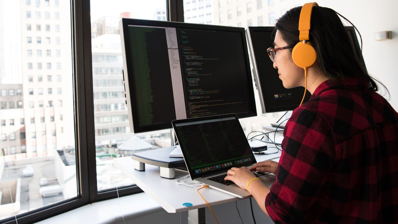 ERP consultant working from a home office on a video call, reflecting recruitment since 2020